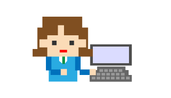 パソコンの前に立った女性社員